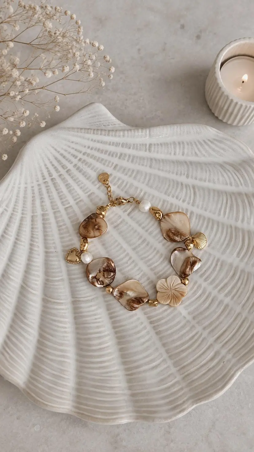 Beautiful mother-of-pearl bracelet with freshwater pearls and stainless steel charms, summery frangipani flower design, stainless steel, waterproof