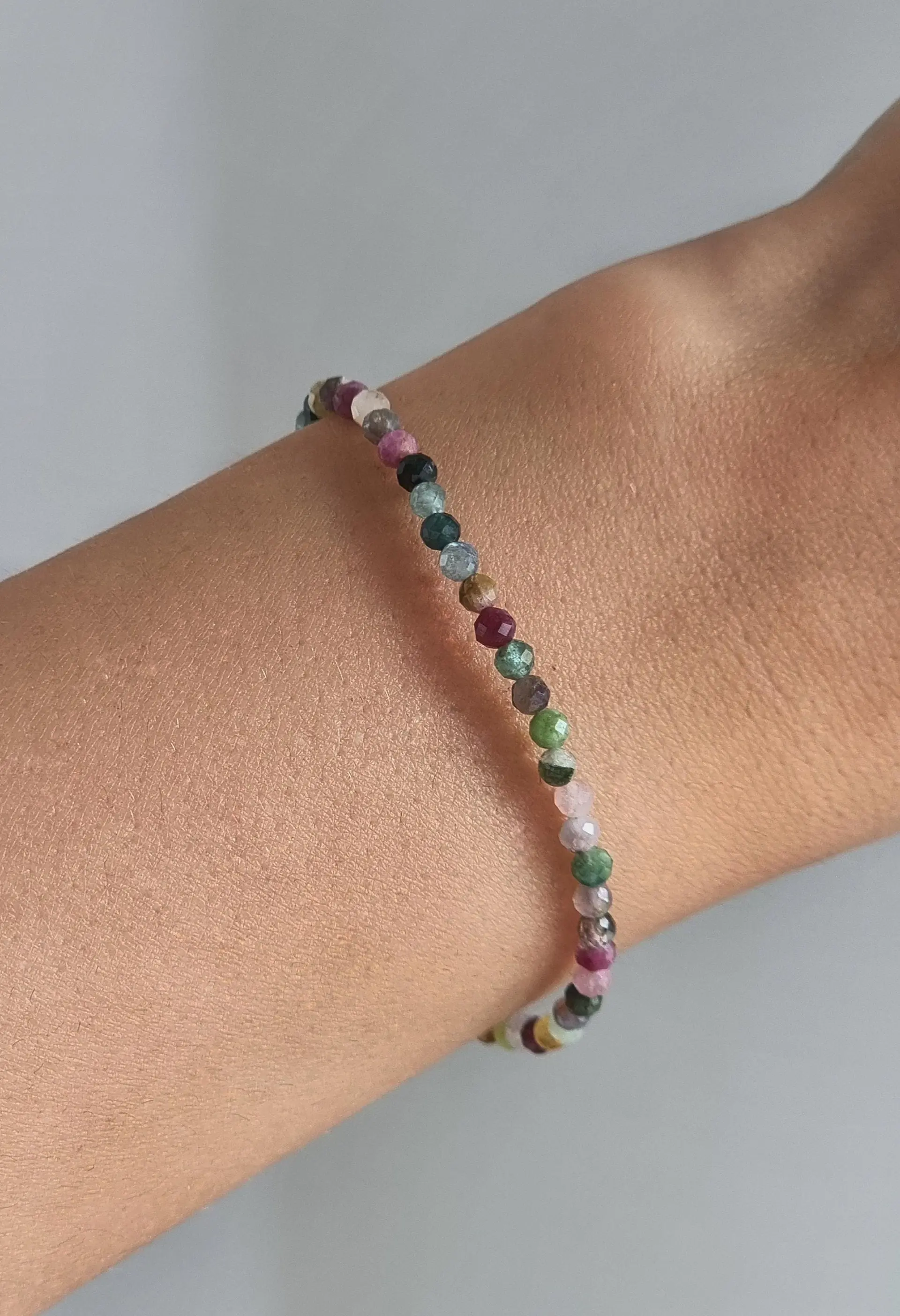 Delicate bracelet with colorful tourmaline semi-precious stone and gold-plated stainless steel clasp, waterproof