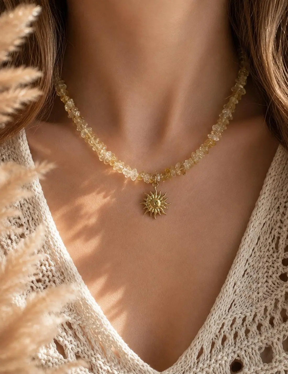 Statement necklace featuring semi-precious citrine stone with stainless steel sun pendant and stainless steel clasp